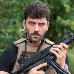 Can Nergis as Tolga Erlik
