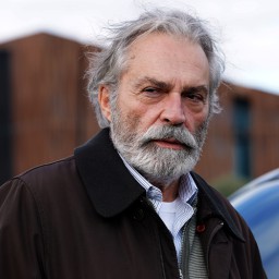 Haluk Bilginer as Emin Saruhanlı